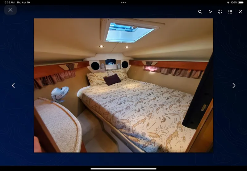Slide: The Image of Interior cabin of 2008 Rinker 400 Express Cruiser with cozy bed and skylight. - 31