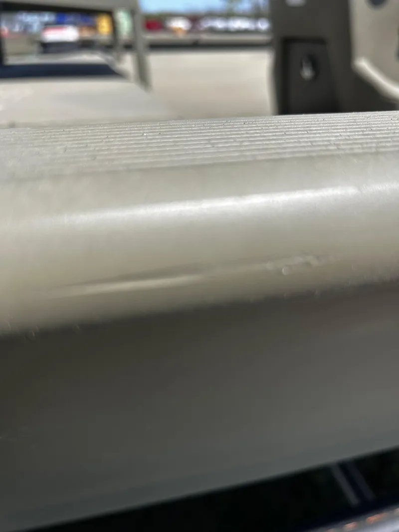 Slide: The Image of Close-up of 2024 Tracker Grizzly 2072 CC Sportsman boat surface detail. - 24