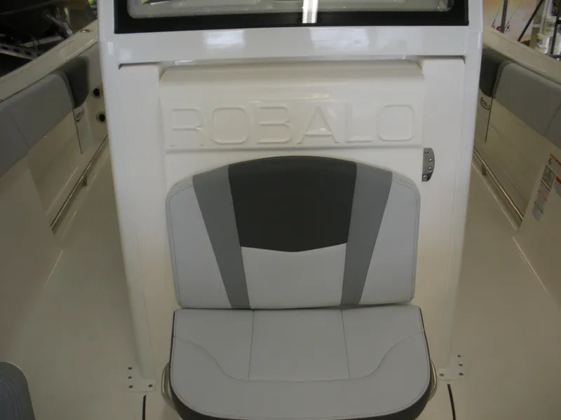 Slide: The Image of 2025 Robalo R270 Center Console boat seat with embossed logo. - 5