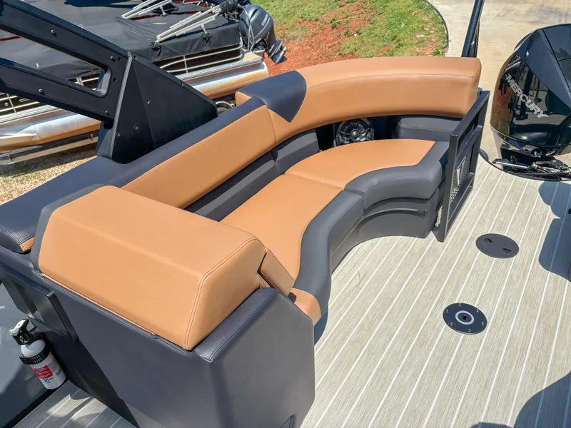 Slide: The Image of Luxurious seating on 2025 Trifecta 25 RF SS boat with tan and black upholstery. - 13