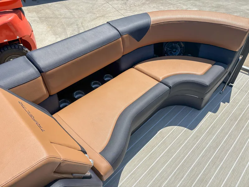Slide: The Image of Luxurious seating on 2025 Trifecta 25 RF SS boat with tan and black upholstery. - 5