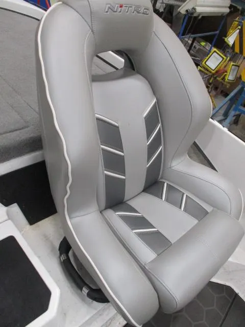 Slide: The Image of 2024 Nitro Z20 boat seat with gray upholstery and stylish design. - 13