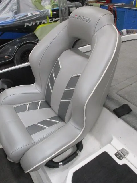 Slide: The Image of 2024 Nitro Z20 boat seat with gray upholstery and sleek design. - 14