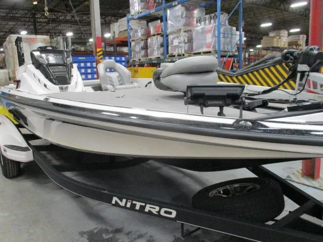 Slide: The Image of 2024 Nitro Z20 boat in warehouse, featuring sleek design and advanced equipment. - 2
