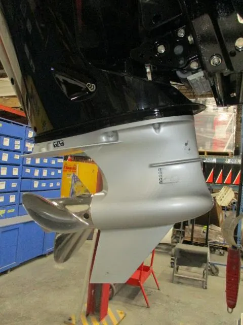 Slide: The Image of 2024 Nitro Z20 boat motor in a workshop setting. - 4