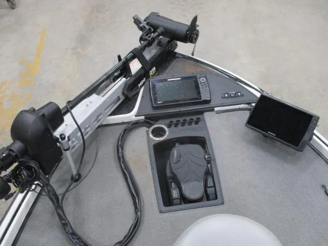 Slide: The Image of 2024 Nitro Z20 boat dashboard with electronic controls and navigation screens. - 8