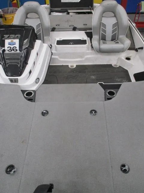 Slide: The Image of 2024 Nitro Z20 boat interior with dual seats and spacious deck layout. - 9