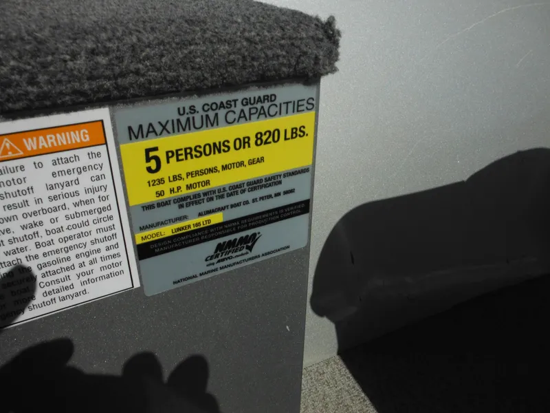 Slide: The Image of 2006 Alumacraft Lunker 165 LTD CS capacity label, 5 persons or 820 lbs, U.S. Coast Guard approved. - 10