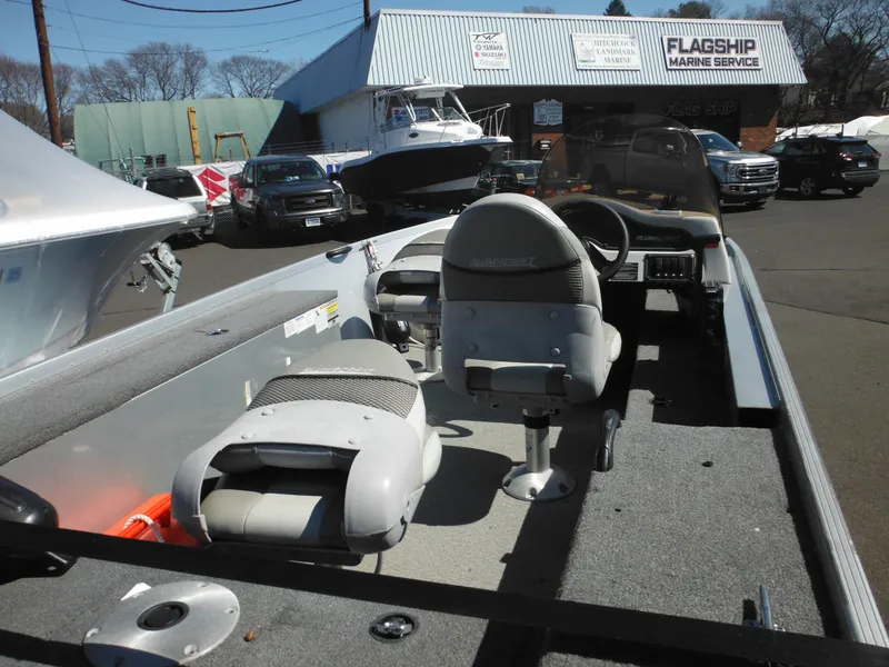 Slide: The Image of 2006 Alumacraft Lunker 165 LTD CS boat interior with seating and steering wheel. - 9