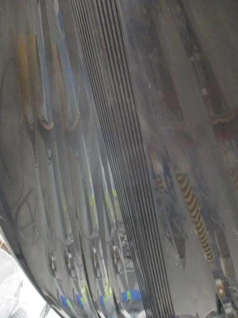 Slide: The Image of Close-up of a 2024 Nitro Z20 boat hull with sleek, reflective surface. - 7