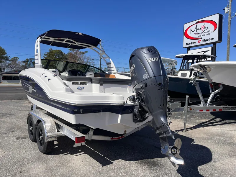 Slide: The Image of 2025 Chaparral 21 SSi OB boat with Yamaha 200 engine on trailer at Marker 17 Marine. - 2