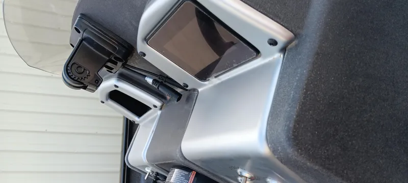 Slide: The Image of Dashboard of 2025 Tracker Pro Team 190 boat with modern controls and display. - 4