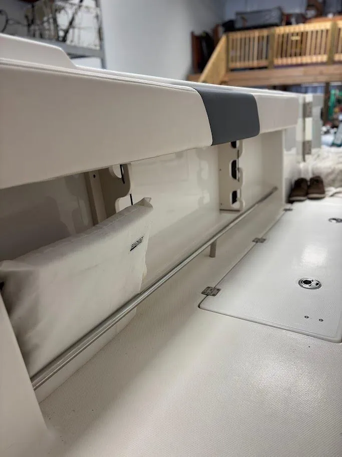 Slide: The Image of 2017 Robalo R302 Center Console interior storage compartment, showcasing sleek design and functionality. - 29