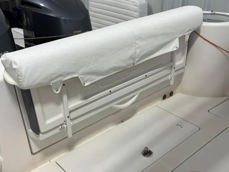 Slide: The Image of 2017 Robalo R302 Center Console boat with covered seating and Yamaha engine. - 3