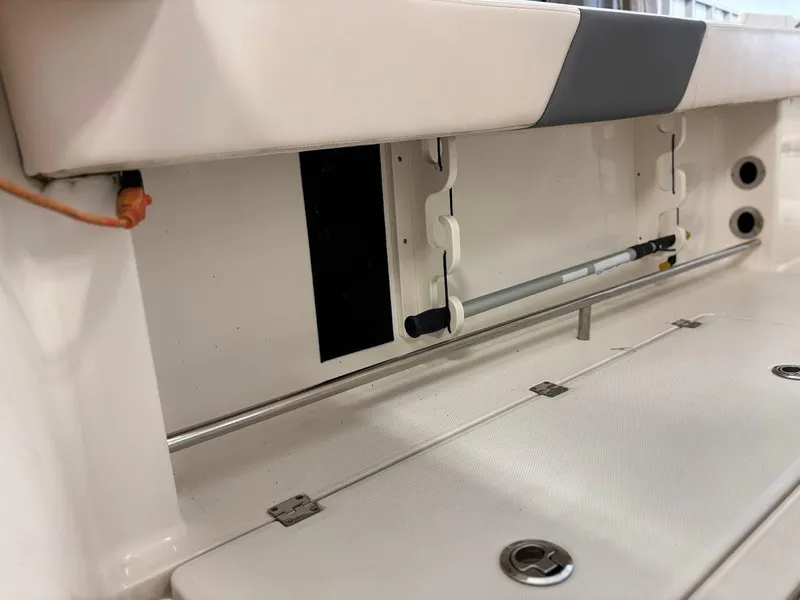 Slide: The Image of 2017 Robalo R302 Center Console boat interior storage compartment detail. - 31