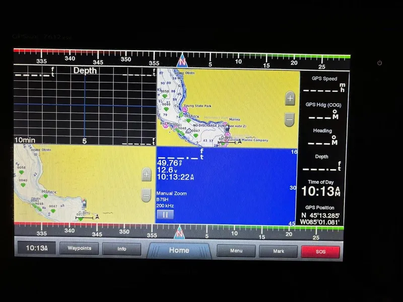 Slide: The Image of Navigation display on 2017 Robalo R302 Center Console showing maps and GPS data. - 33