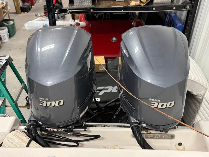 Slide: The Image of Twin Yamaha 300 engines on a 2017 Robalo R302 Center Console boat. - 6