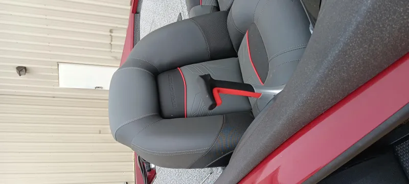 Slide: The Image of 2022 Tracker Pro Team 175 TXW boat seat with gray and red accents. - 3