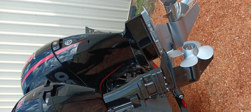 Slide: The Image of 2025 Ranger VX1788 WT boat engine with dual propellers, displayed outdoors. - 20