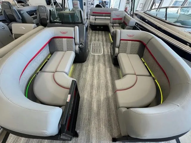 Slide: The Image of 2025 Bennington 22 MSB pontoon boat interior with luxurious seating and modern design. - 11
