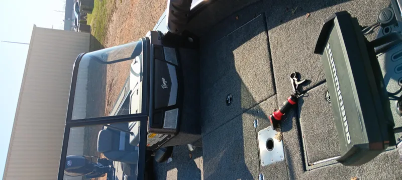 Slide: The Image of 2025 Ranger VX1888 WT boat interior with seating and control panel. - 11