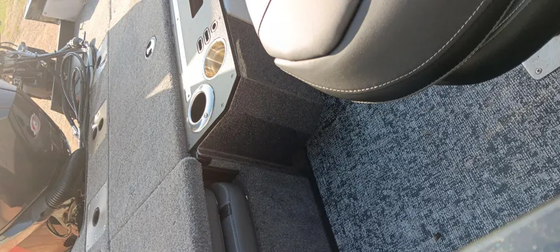 Slide: The Image of 2025 Ranger VX1888 WT boat interior with seating and storage compartments. - 14