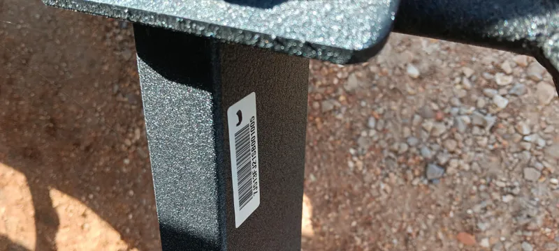 Slide: The Image of Close-up of a 2025 Ranger VX1888 WT metal component with a barcode label. - 21