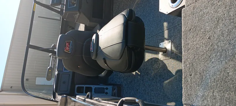 Slide: The Image of 2025 Ranger VX1888 WT boat interior with black seating and control panel. - 6