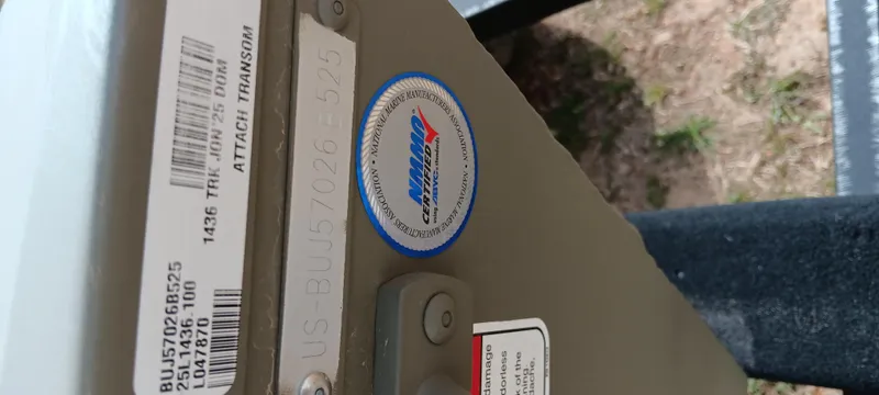 Slide: The Image of 2025 Tracker Grizzly 1436 Utility boat identification labels and certification sticker. - 8