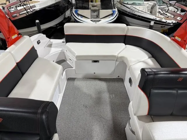 Slide: The Image of Interior of 2016 Four Winns TS242 boat with white and black seating. - 7