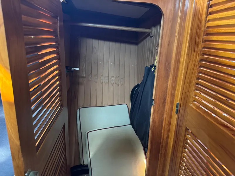 Slide: The Image of Wooden closet interior on a 1988 Cabo Rico 38XL yacht. - 20