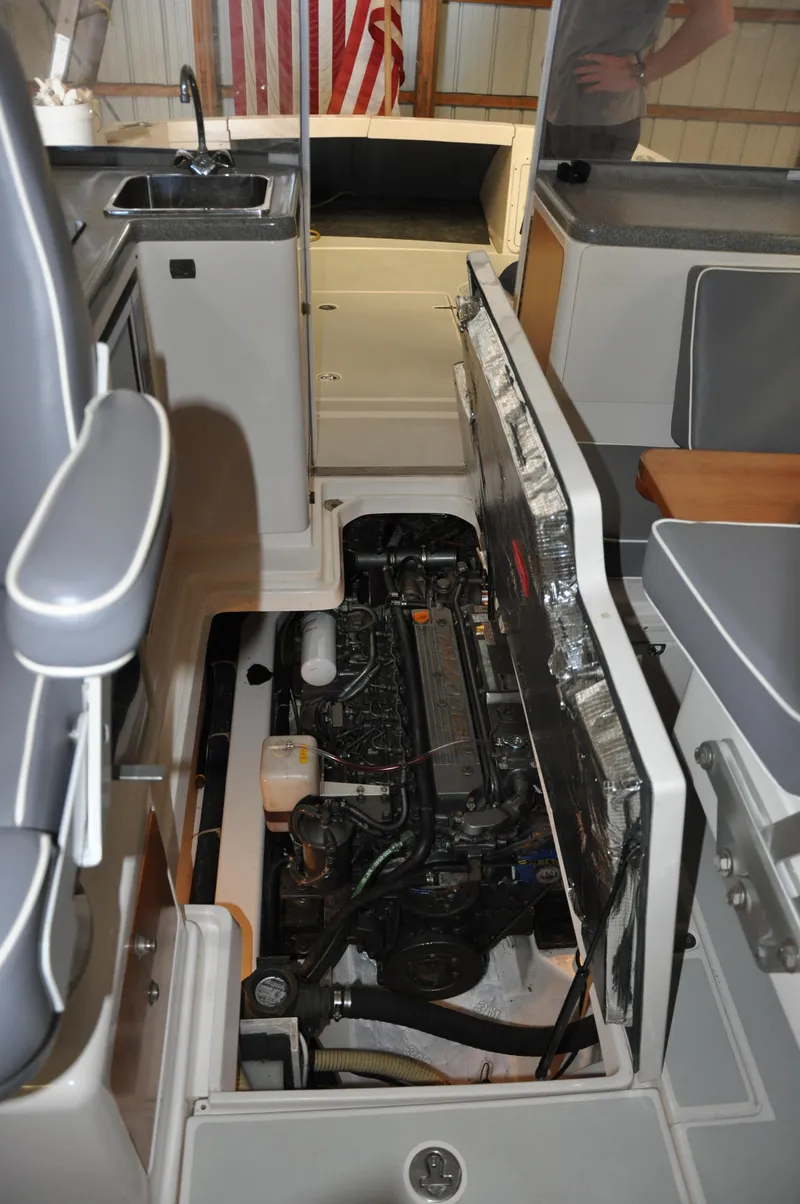 Slide: The Image of Engine compartment of a 2005 True North 33 boat, showcasing interior details and components. - 46