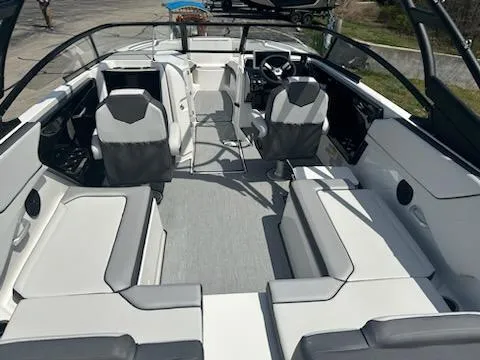 Slide: The Image of 2025 Yamaha Boats AR250 interior with sleek seating and modern design. - 6