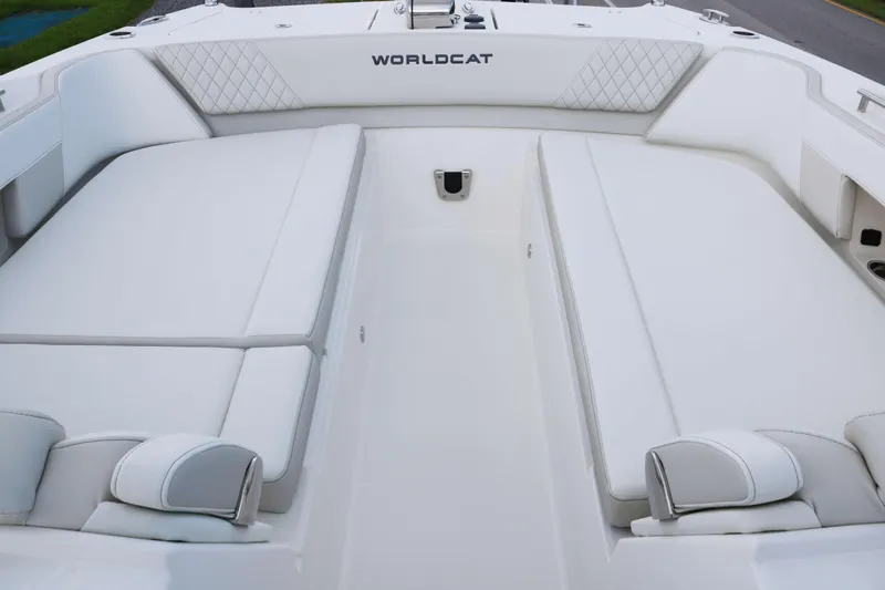 Slide: The Image of Luxurious seating on 2026 World Cat 325 DC boat, featuring elegant white upholstery. - 8