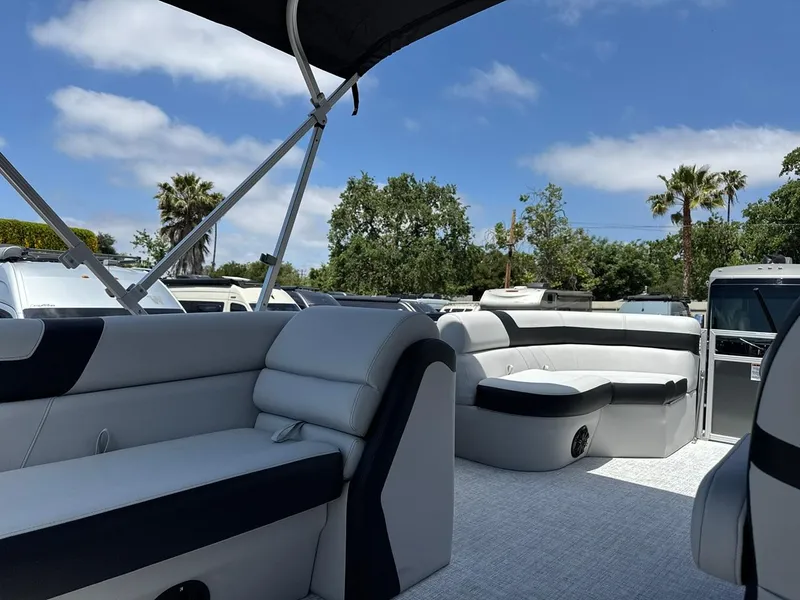 Slide: The Image of 2025 South Bay 18CR SE S Cruise pontoon boat with spacious seating and canopy. - 10