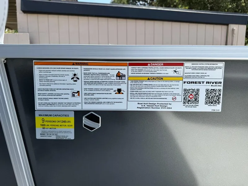 Slide: The Image of 2025 South Bay 18CR SE S Cruise warning labels and capacity information on a boat panel. - 18
