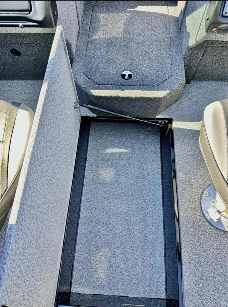 Slide: The Image of 2025 Lund 1875 Crossover XS interior, featuring seating and storage area. - 11