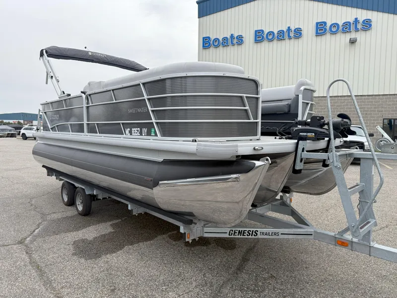 Slide: The Image of 2023 Godfrey Sweetwater 2286 FS pontoon boat on Genesis trailer outside dealership. - 4