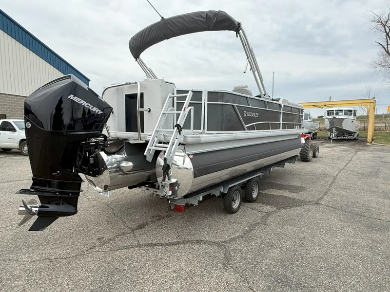 Slide: The Image of 2023 Godfrey Sweetwater 2286 FS pontoon boat on trailer, featuring Mercury outboard motor. - 5