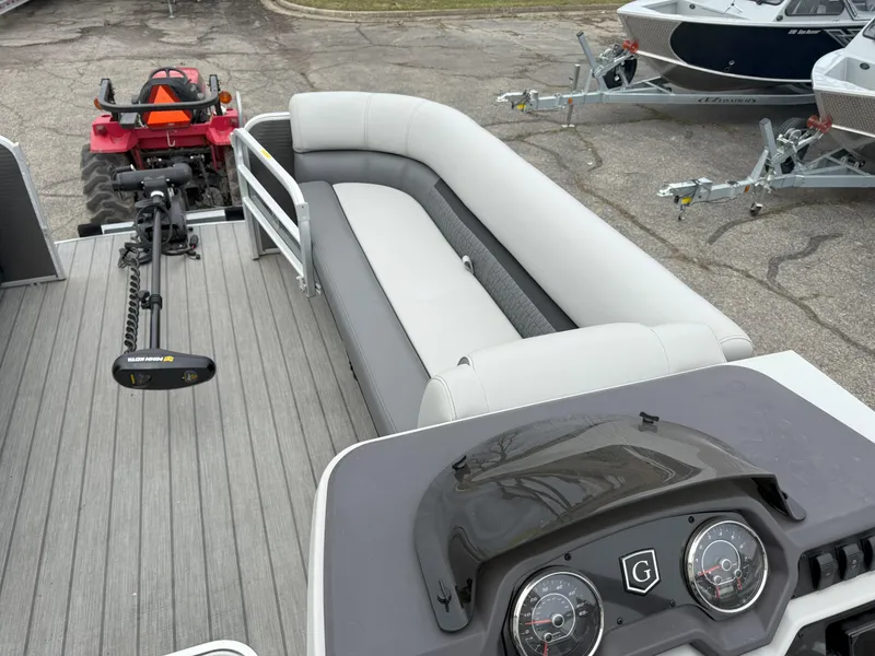 Slide: The Image of 2023 Godfrey Sweetwater 2286 FS pontoon boat interior with seating and dashboard. - 8