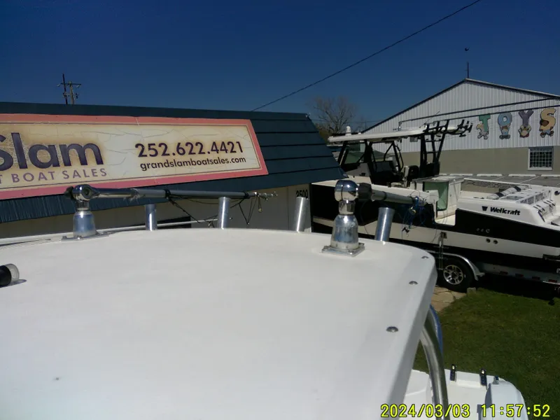Slide: The Image of 2013 Sea Fox 236 Voyager boat at Grand Slam Boat Sales dealership. - 25