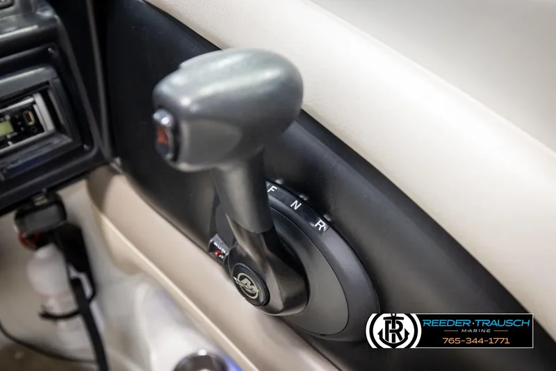 Slide: The Image of 2014 Crownline 255 SS boat throttle control with forward, neutral, reverse settings. - 33