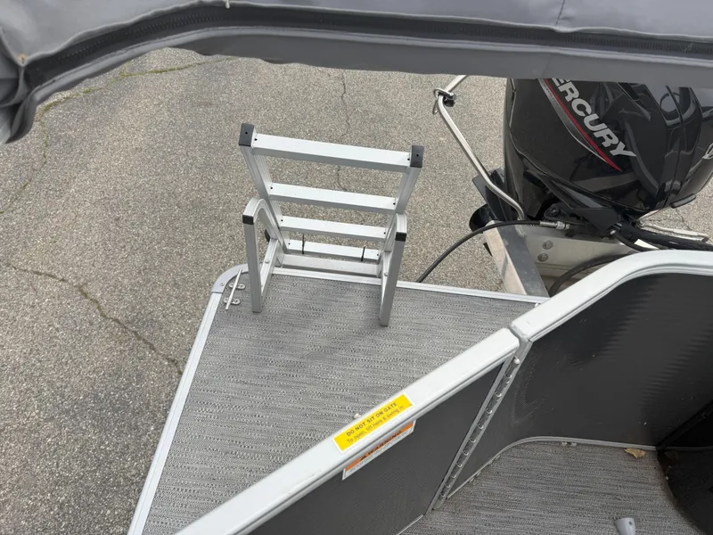 Slide: The Image of 2022 Godfrey Sweetwater 1886 FX boat with ladder and Mercury engine. - 16