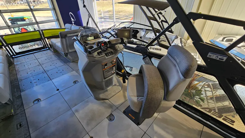 Slide: The Image of 2023 Sea-Doo Switch Cruise 21 interior with modern dashboard and seating. - 13