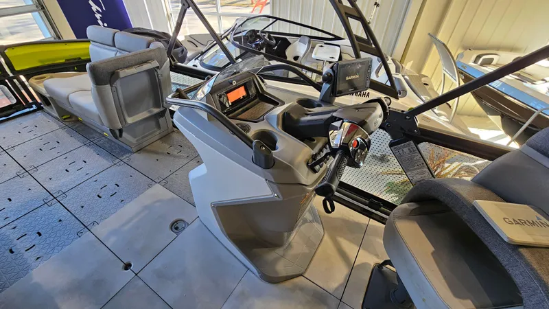 Slide: The Image of 2023 Sea-Doo Switch Cruise 21 interior with modern controls and seating. - 15