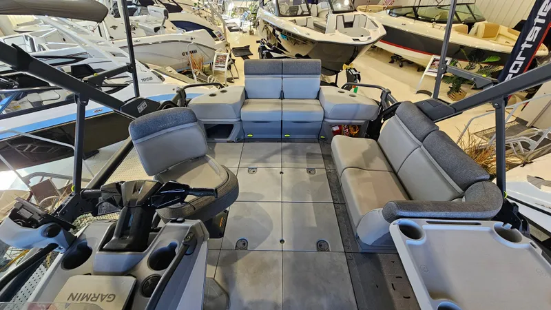 Slide: The Image of 2023 Sea-Doo Switch Cruise 21 interior with spacious seating and modern design in showroom. - 7