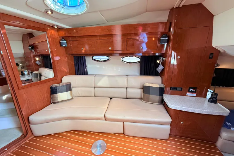 Slide: The Image of Luxurious interior of 2007 Regal Commodore 3760 IB yacht with leather seating and wood finish. - 12