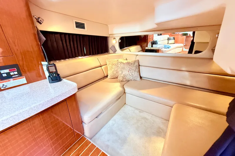 Slide: The Image of Luxurious interior of 2007 Regal Commodore 3760 IB yacht with beige seating and elegant decor. - 15