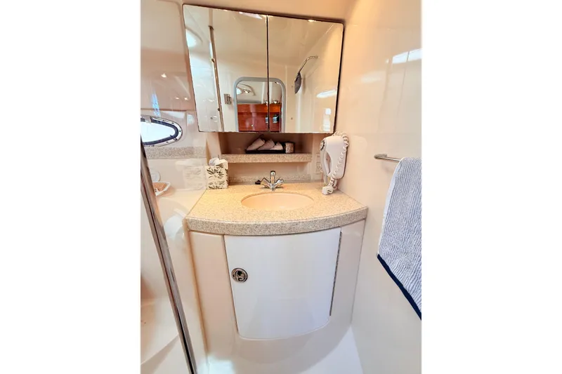 Slide: The Image of Luxurious bathroom in 2007 Regal Commodore 3760 IB yacht with modern fixtures. - 21