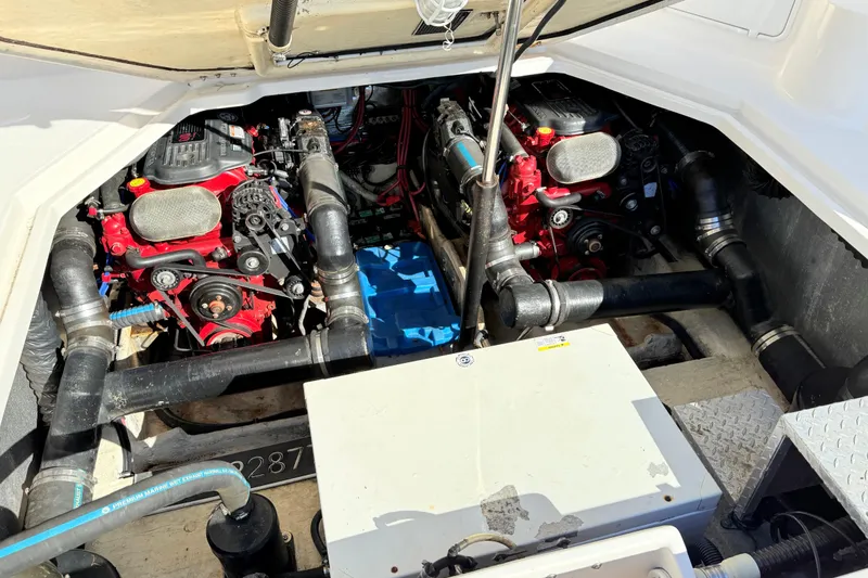 Slide: The Image of Engine compartment of a 2007 Regal Commodore 3760 IB boat, featuring dual engines. - 23